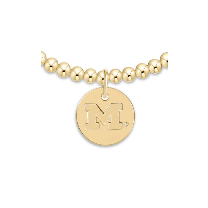 enewton eCollegiate Classic Gold 3mm bracelet with the University of Michigan disc